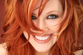 Woman with beautifully done red hair.