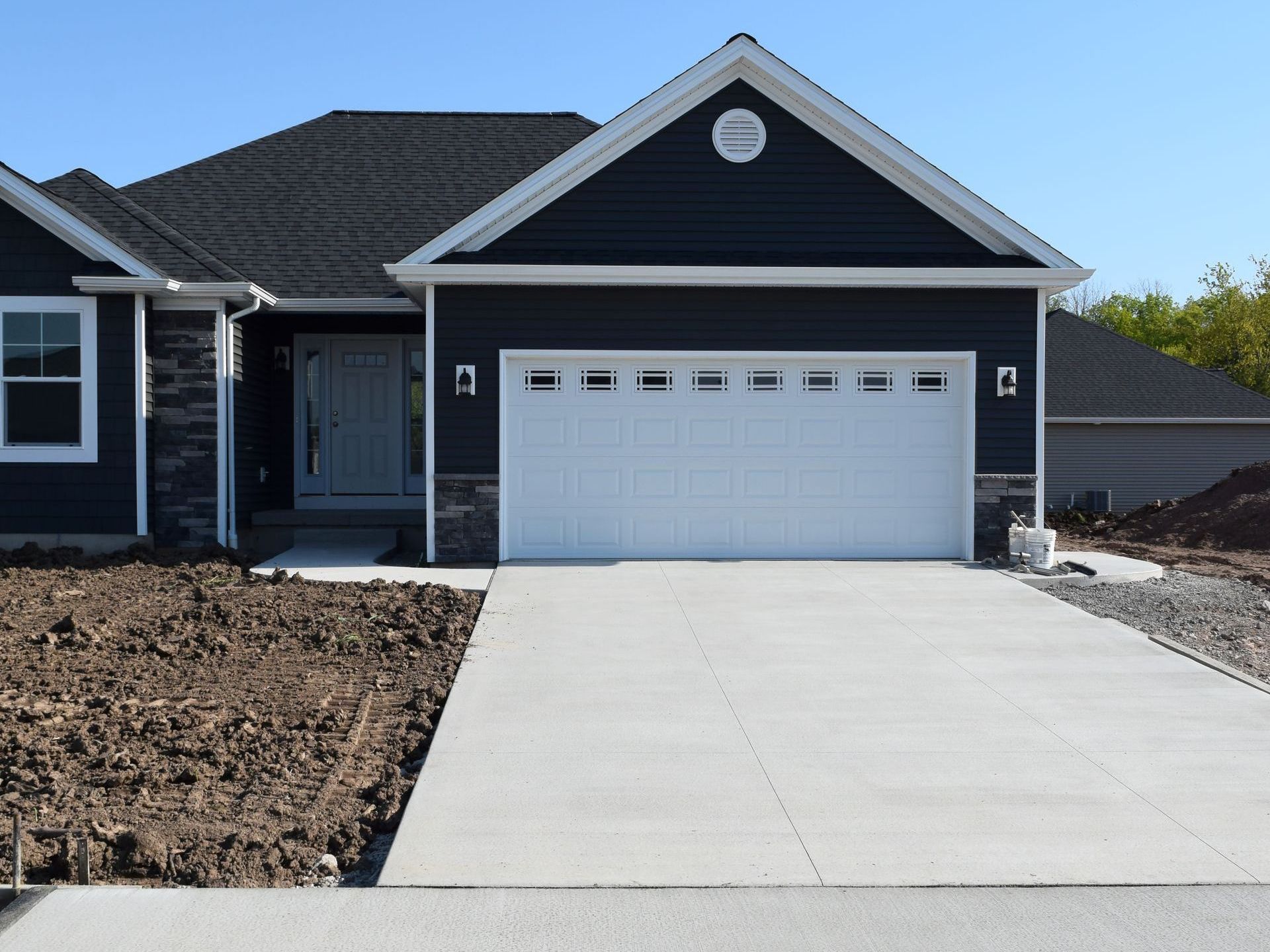 nice house with smooth newly installed concrete driveway
