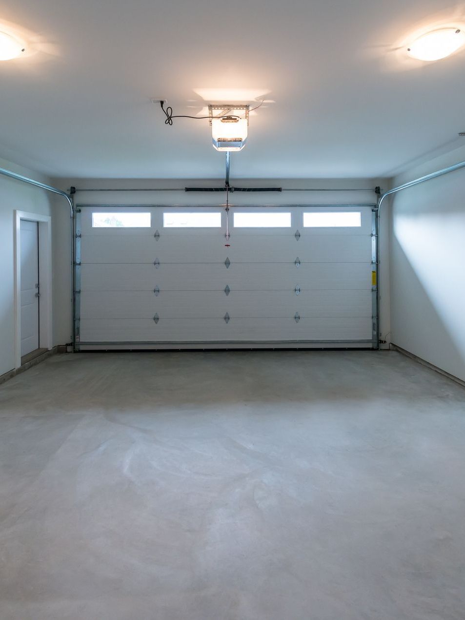 empty newly constructed garage with smooth concrete floor