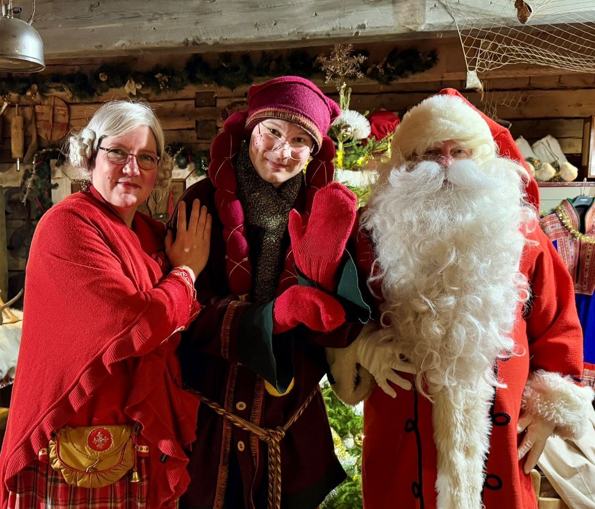 Santa Claus and Elf in a secret hideaway Levi Finland meeting the guests