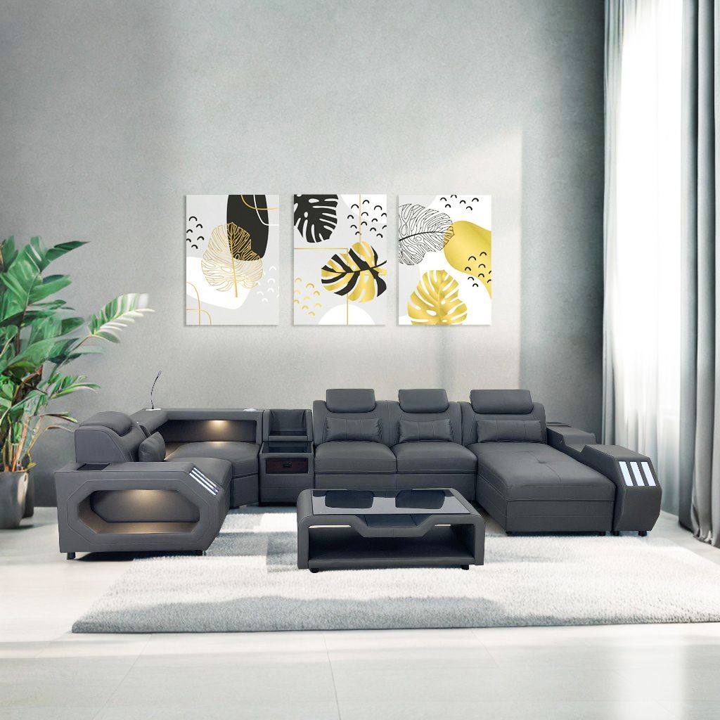 A living room with a sectional couch and a coffee table