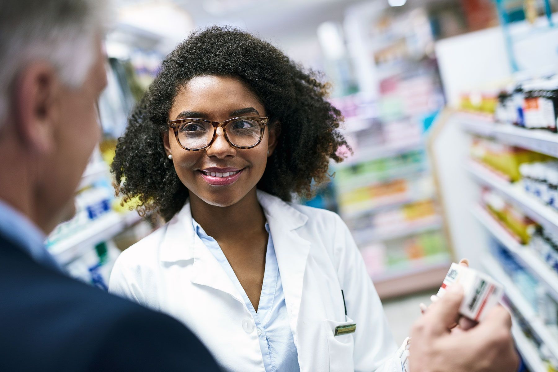 Pharmacist helping a customer
