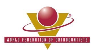 Logo of the World Federation of Orthodontists: A gold triangle with a red sphere and orbiting red lines.