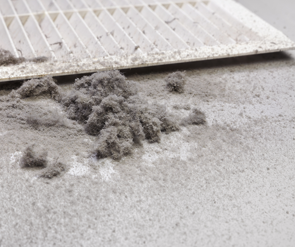 Accumulated dust from air duct indicating need for affordable duct cleaning services