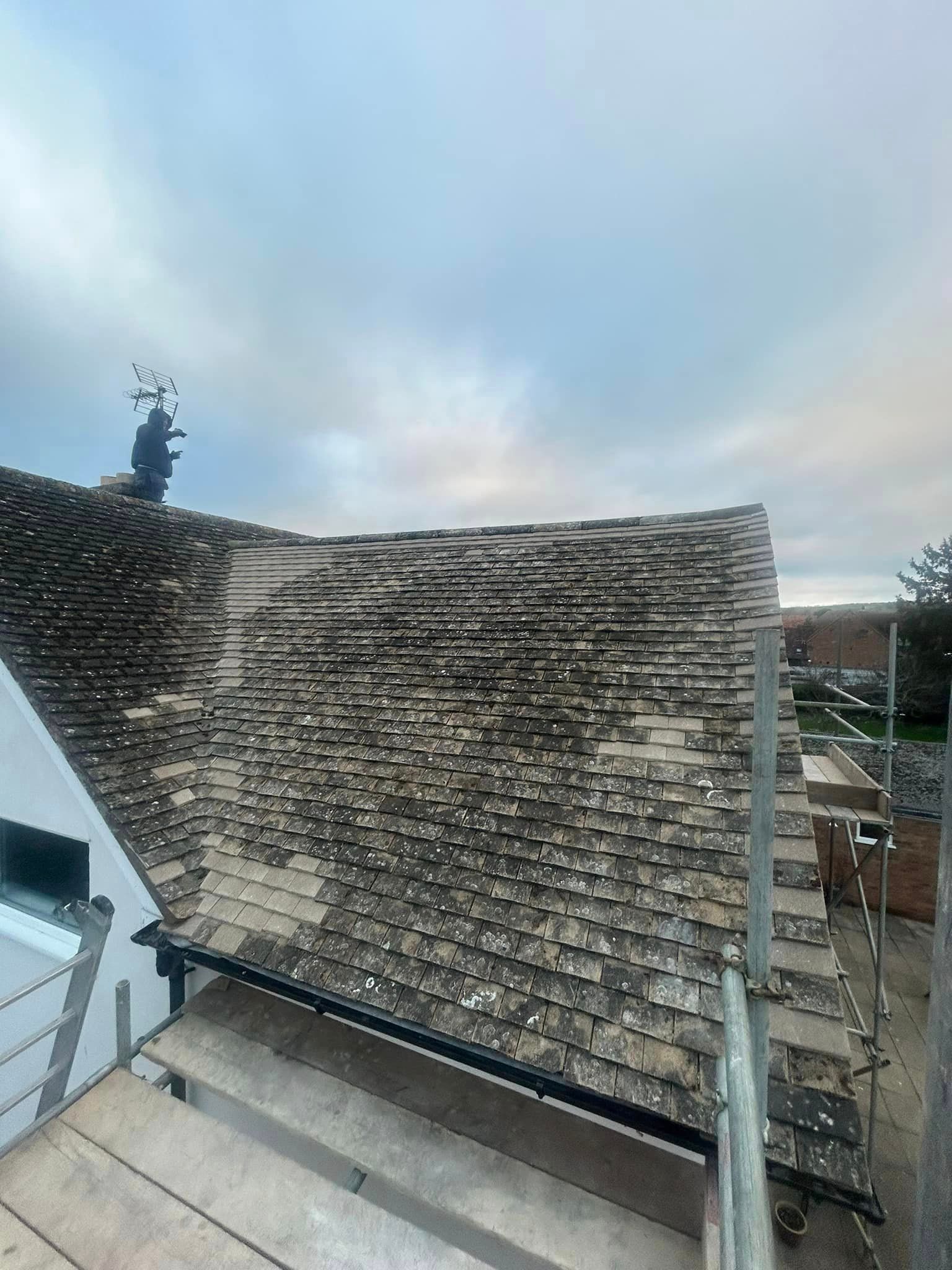 A roof with a chimney on top of it.