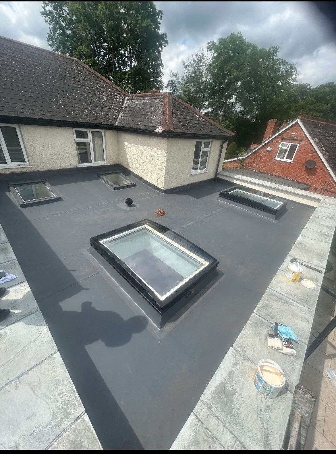 A roof with a lot of skylights on it