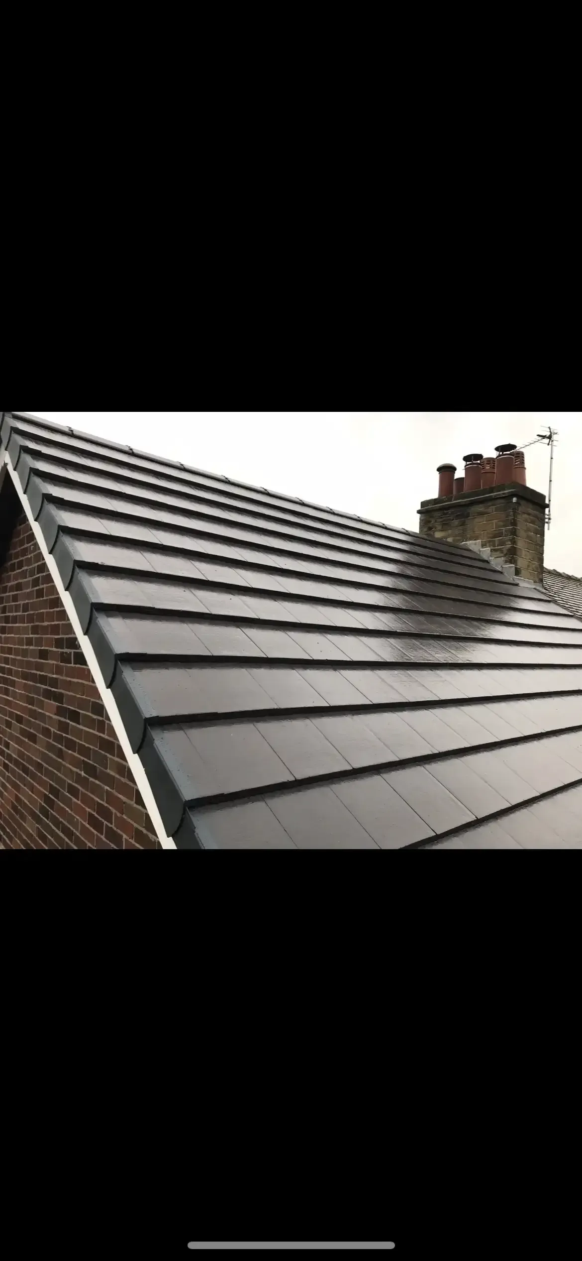 A roof with a chimney on top of it.