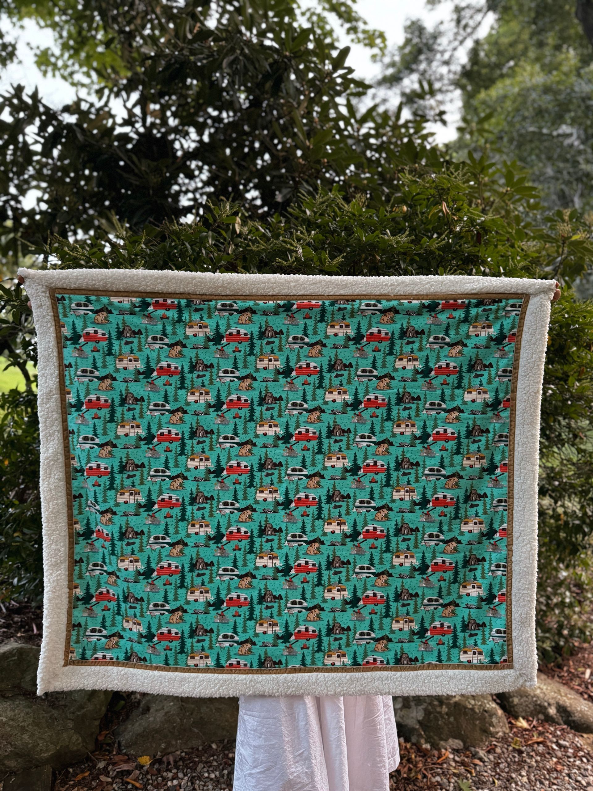 kadori sherpa baby blanket with teal caping printed material