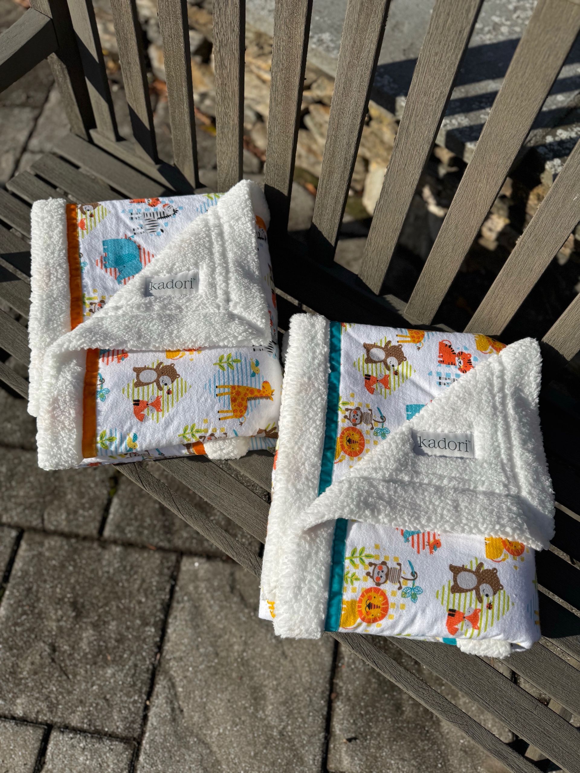 kadori sherpa baby blanket with bright jungle animal printed material