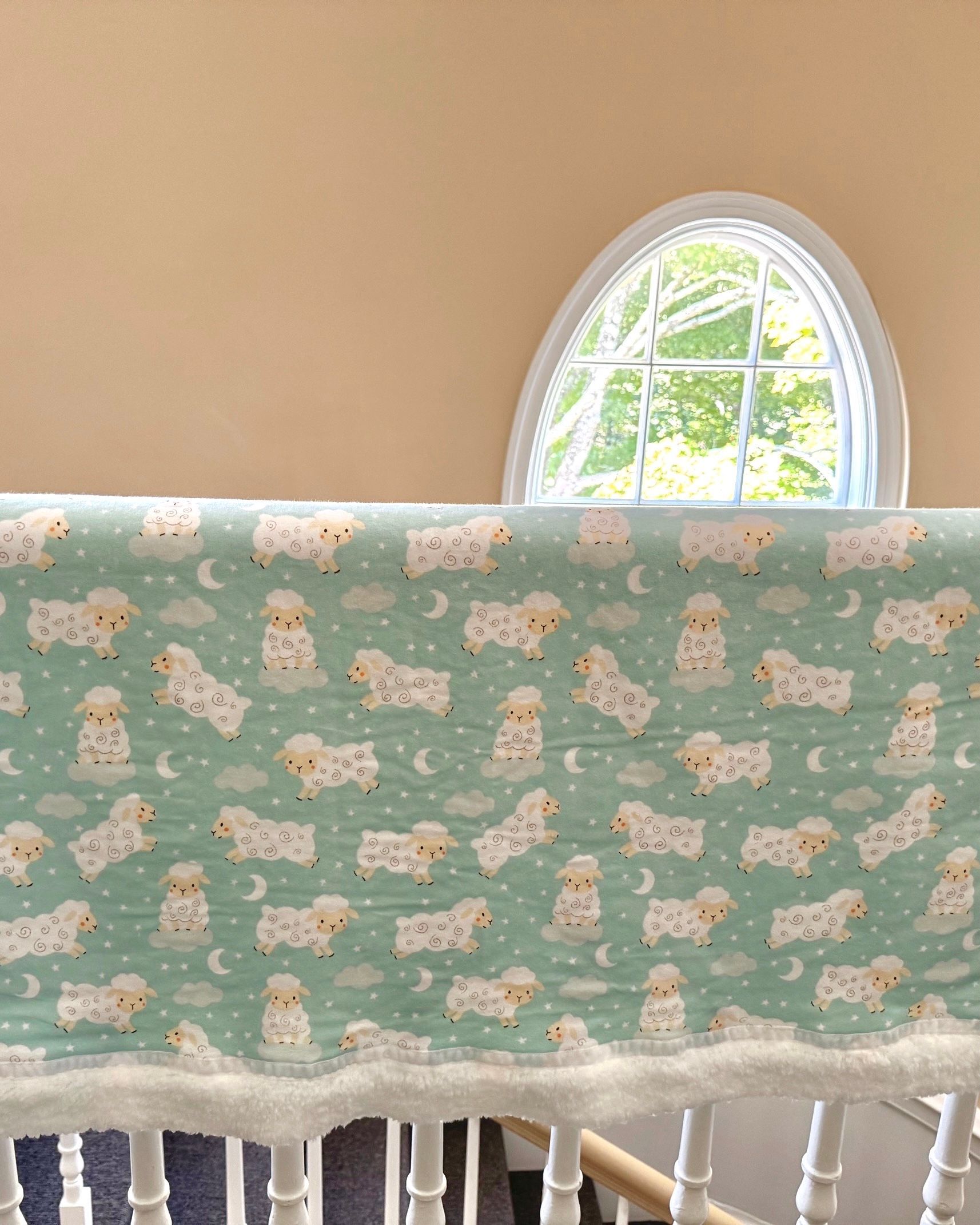 sleepy sheep material blanket in bag