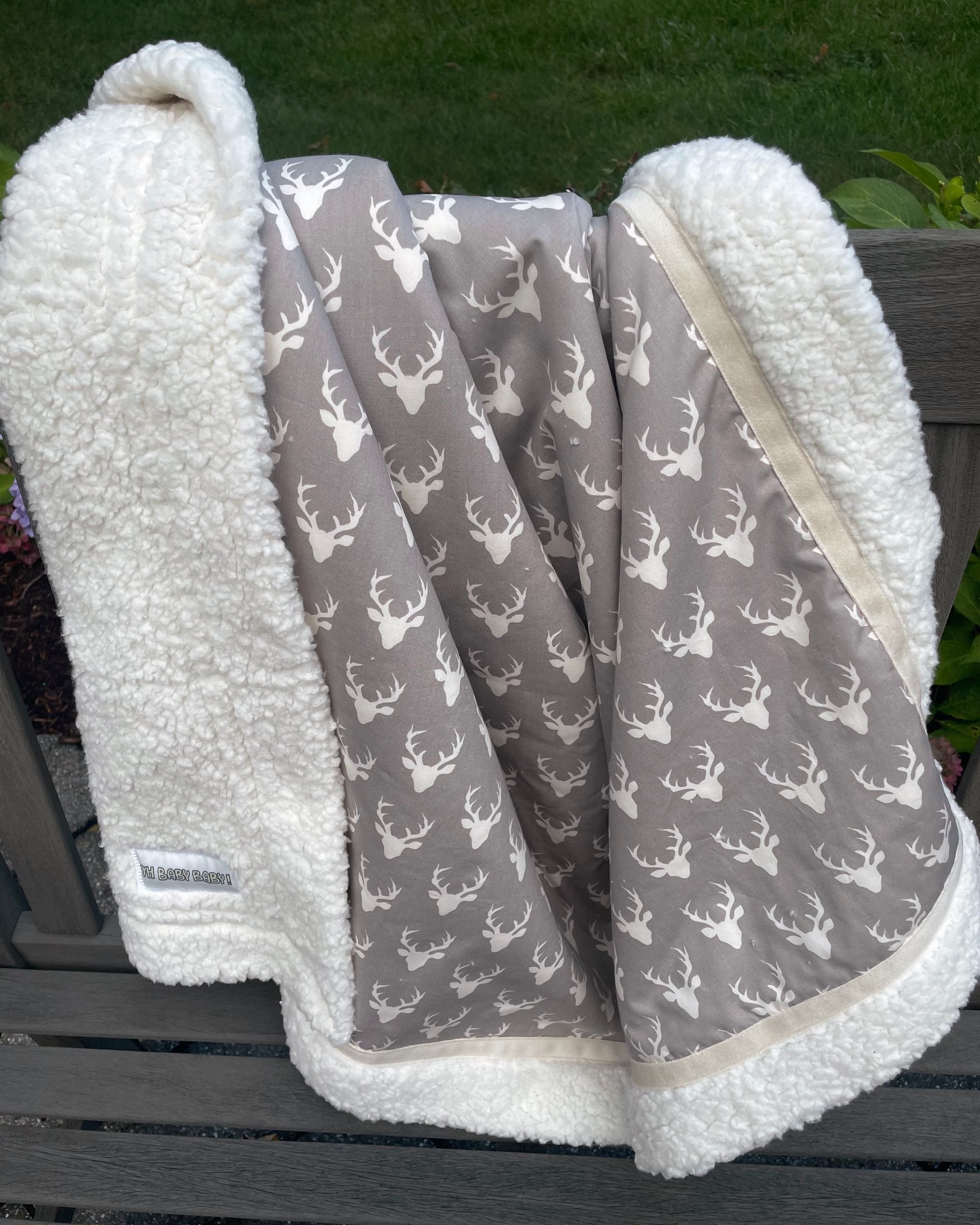 kadori blanket with white antlers on grey background