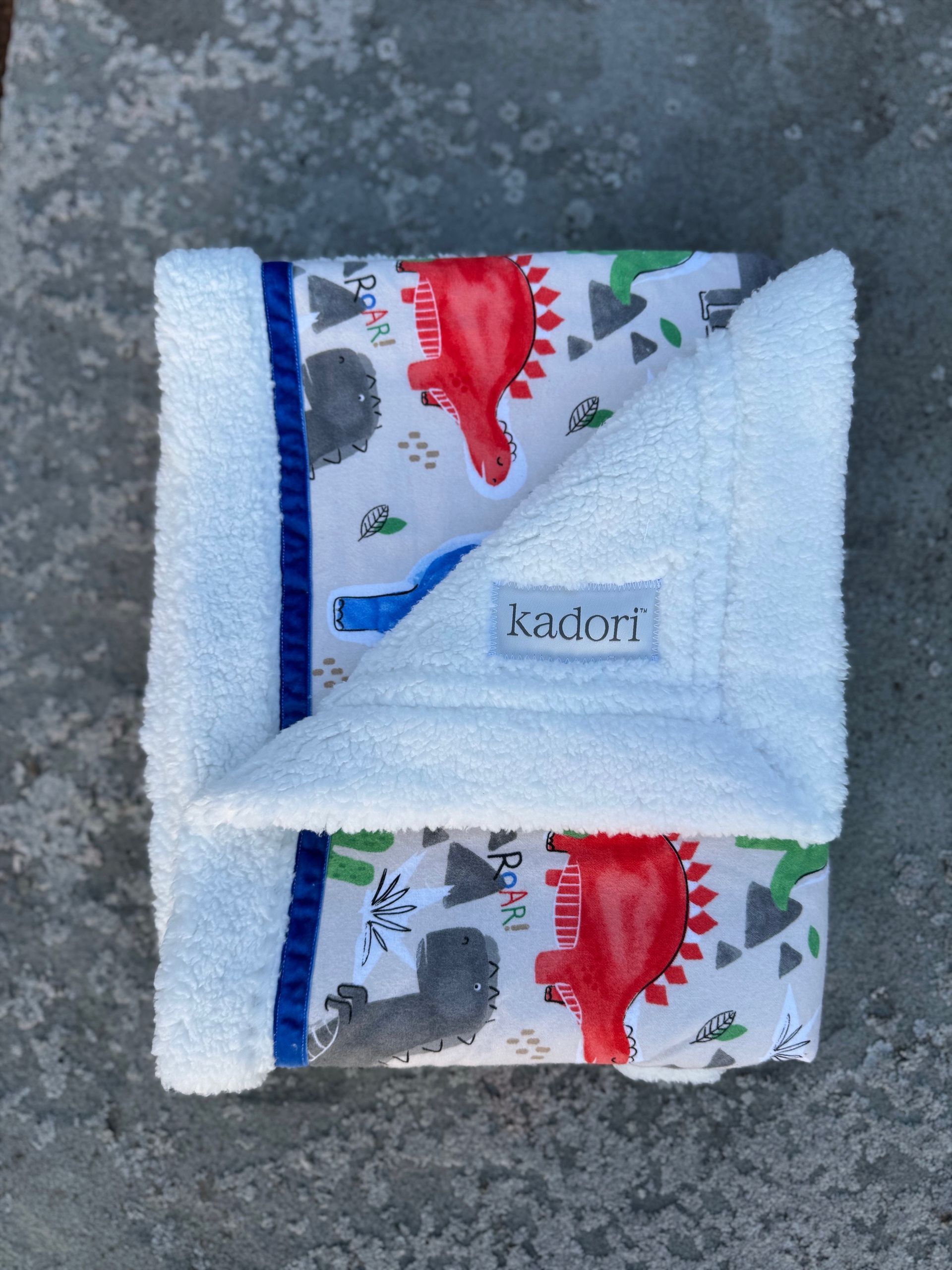 kadori sherpa baby blanket with dinosaur printed material