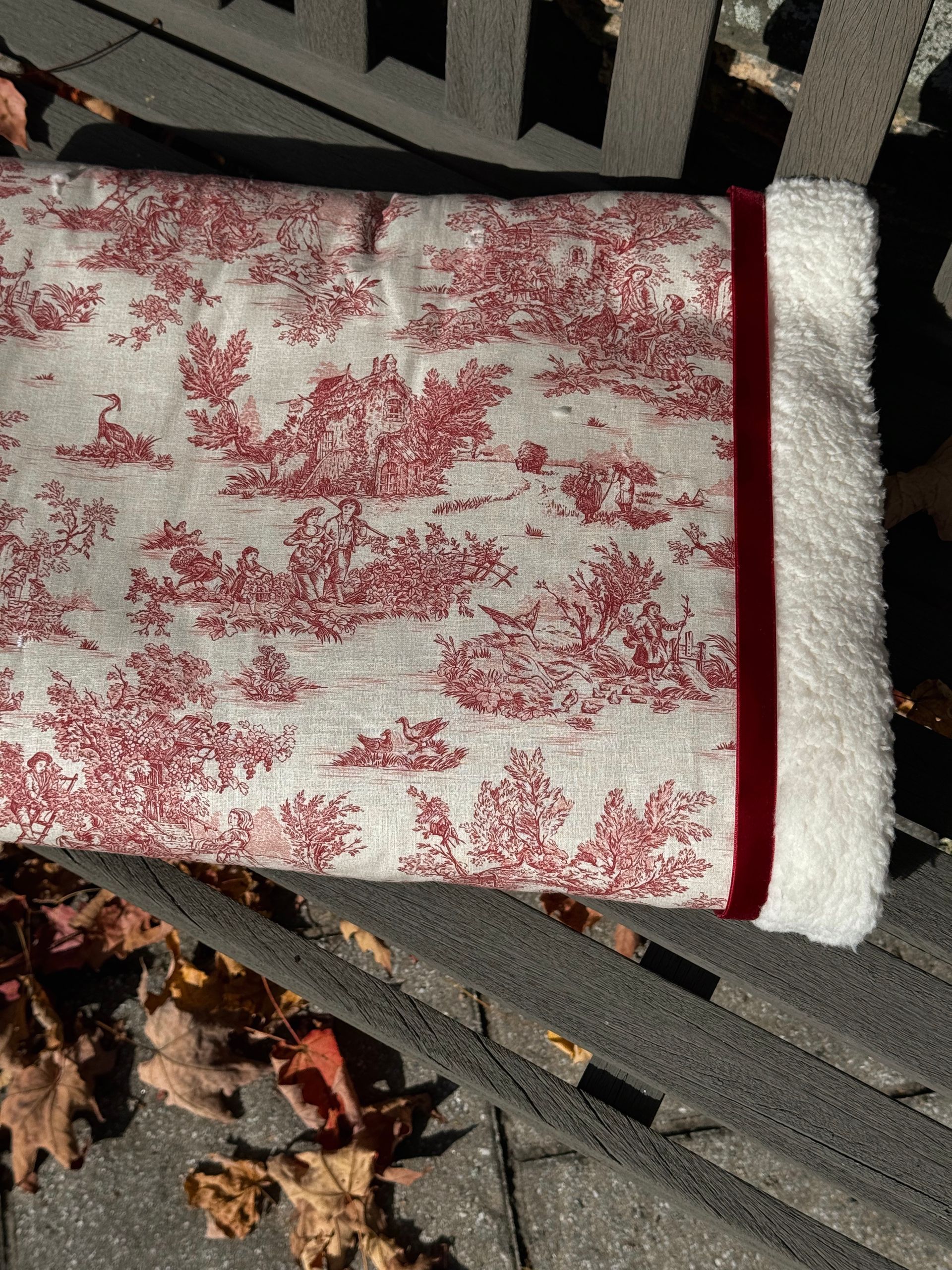 sherpa blankets with printed material that is a red toile fabric