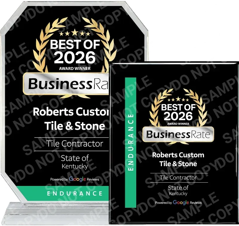 Two 2026 BusinessRate award plaques for Roberts Custom Tile & Stone in Kentucky, featuring a black, white, and teal design.