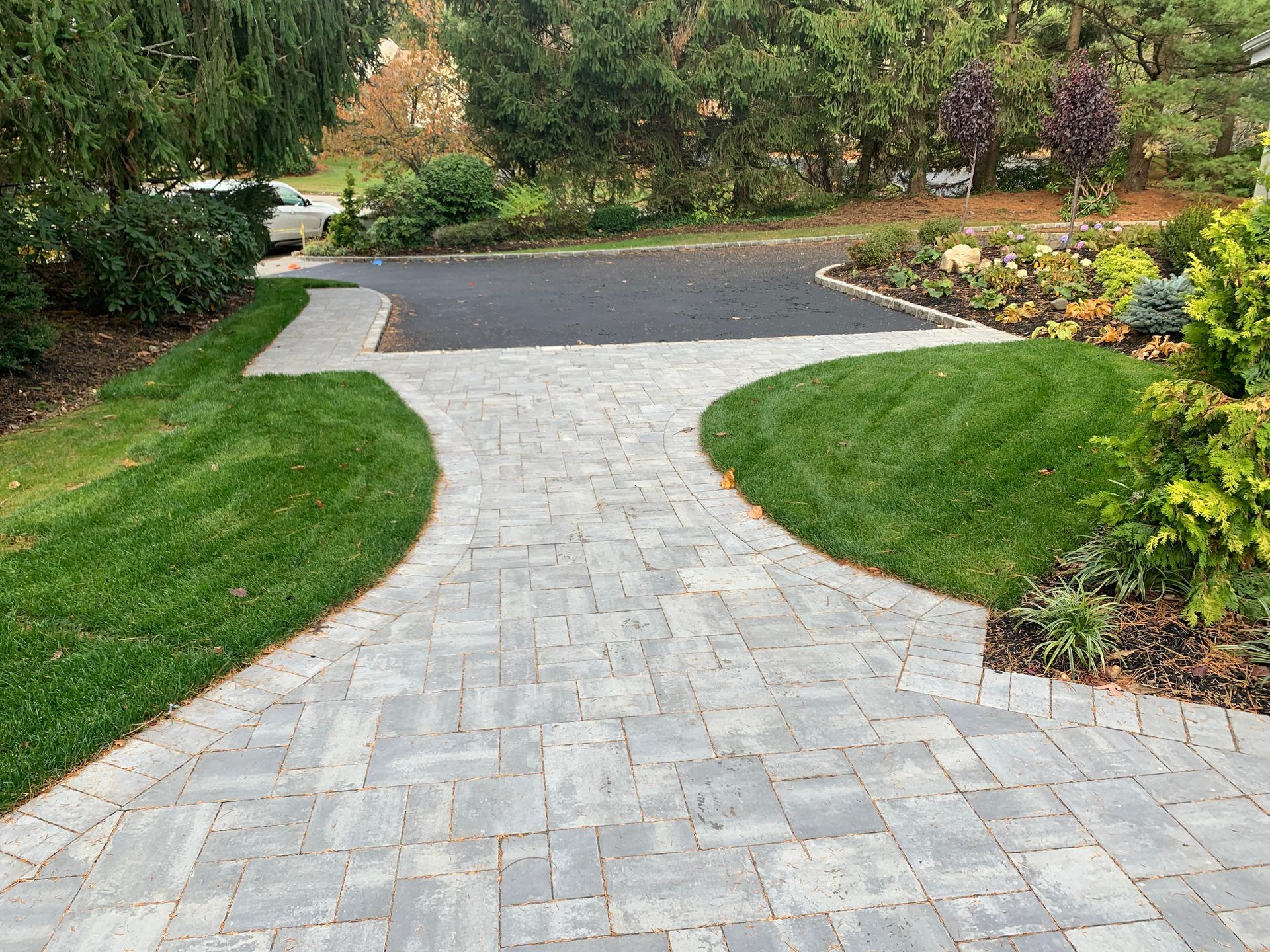 Brick Walkway along with the Concrete Driveway — Westbury, NY — A&M D’Alessandro Contractors Inc.