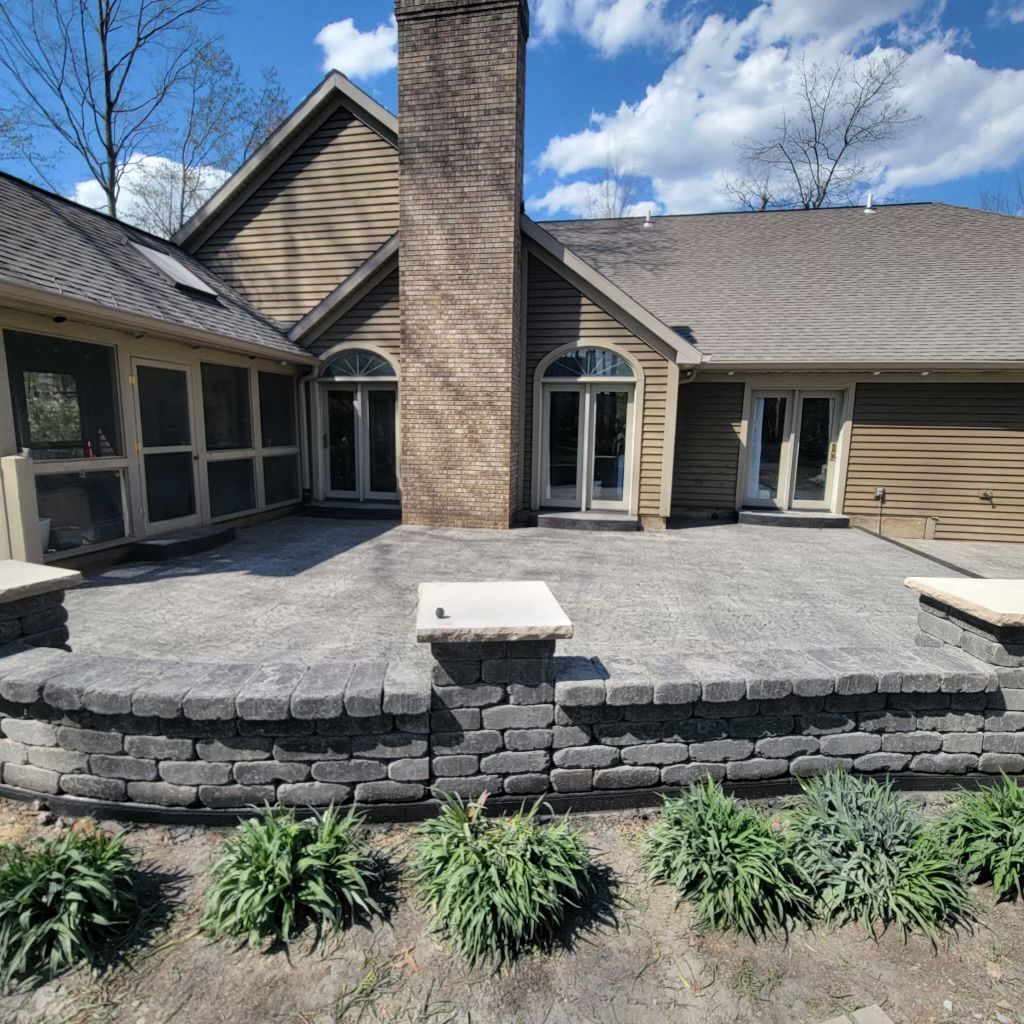 A large house with a patio and a screened in porch
