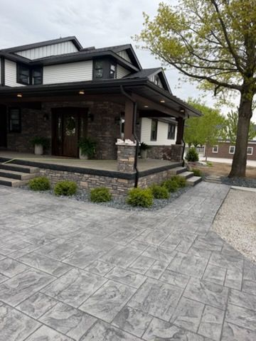 Stamped concrete patio and decorative walkway installed by D & M Concrete in Fort Wayne, Indiana.