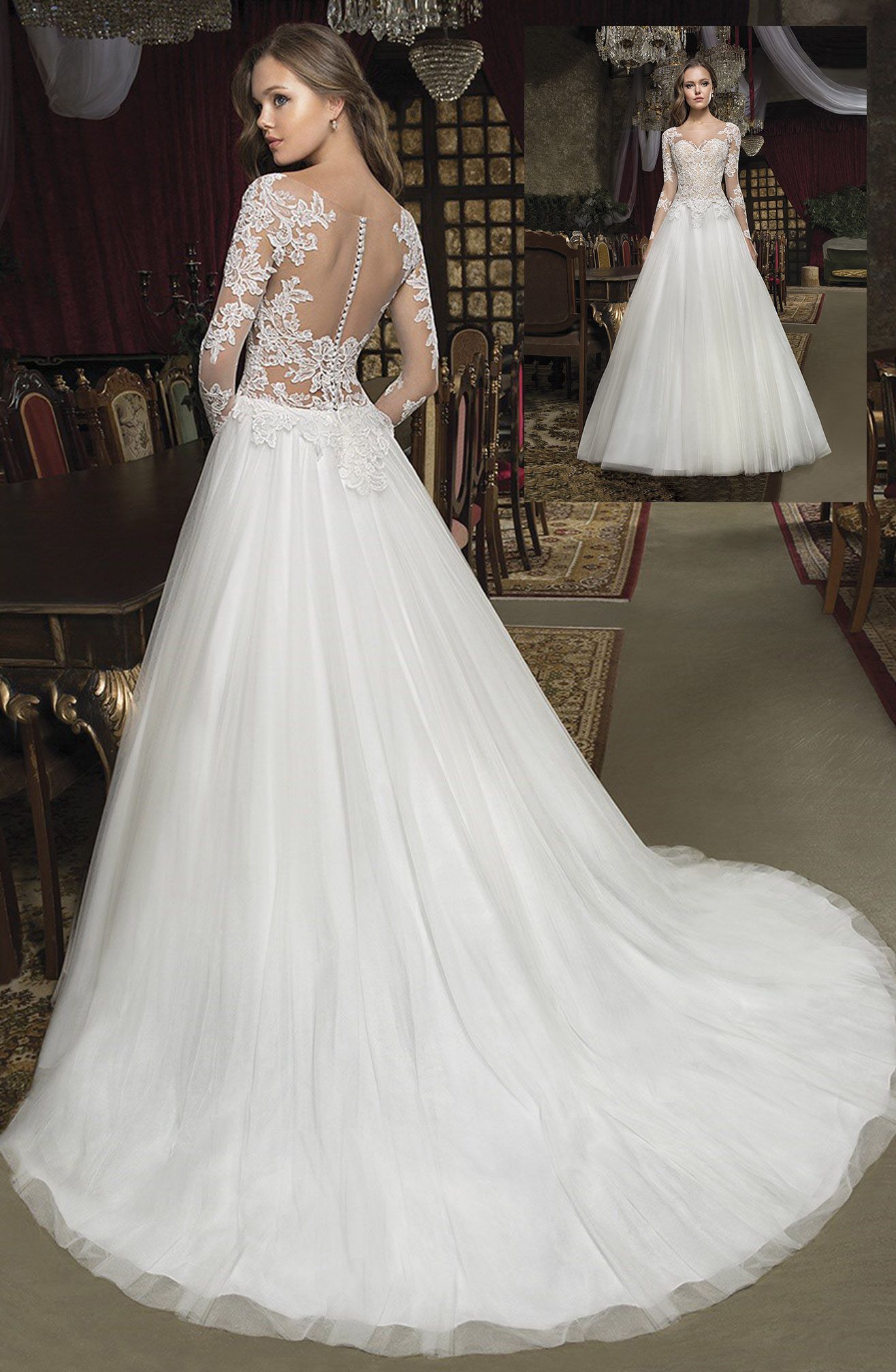 Una donna in abito da sposa bianco è in piedi in una stanza.