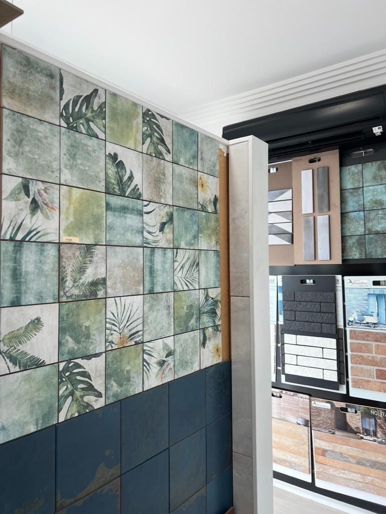 A Room With a Lot of Tiles on the Wall and a Ceiling Fan — Traditional Tiles & Flooring In Woree, QLD