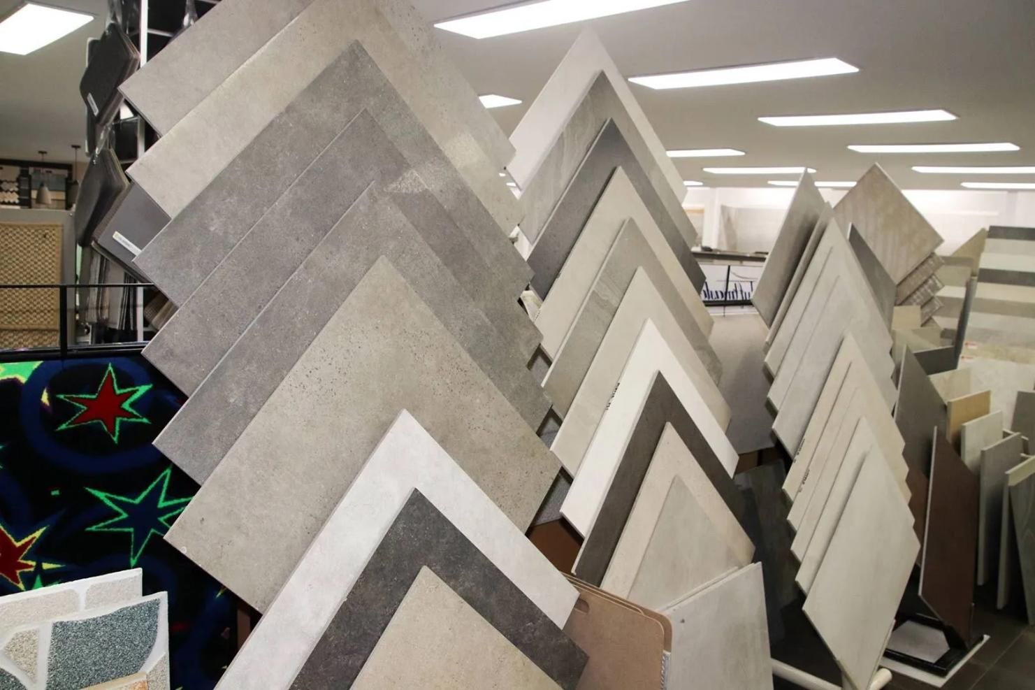 A Bunch of Tiles Are Stacked on Top of Each Other — Traditional Tiles & Flooring in Palm Cove, QLD