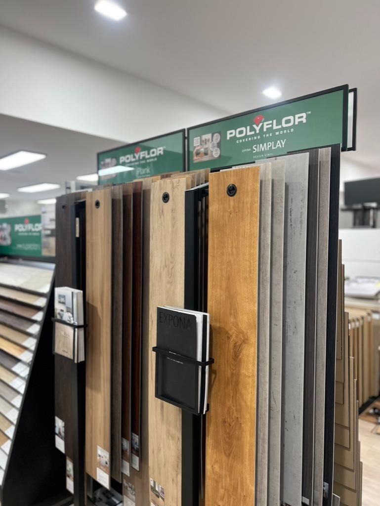 A Display of Wooden Flooring in a Store — Traditional Tiles & Flooring In Woree, QLD