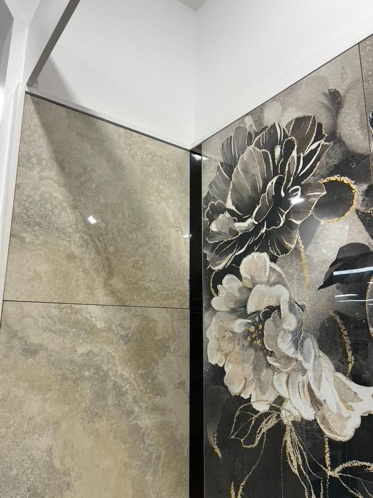 A Wall With a Picture of Flowers on It — Traditional Tiles & Flooring In Cassowary Coast, QLD