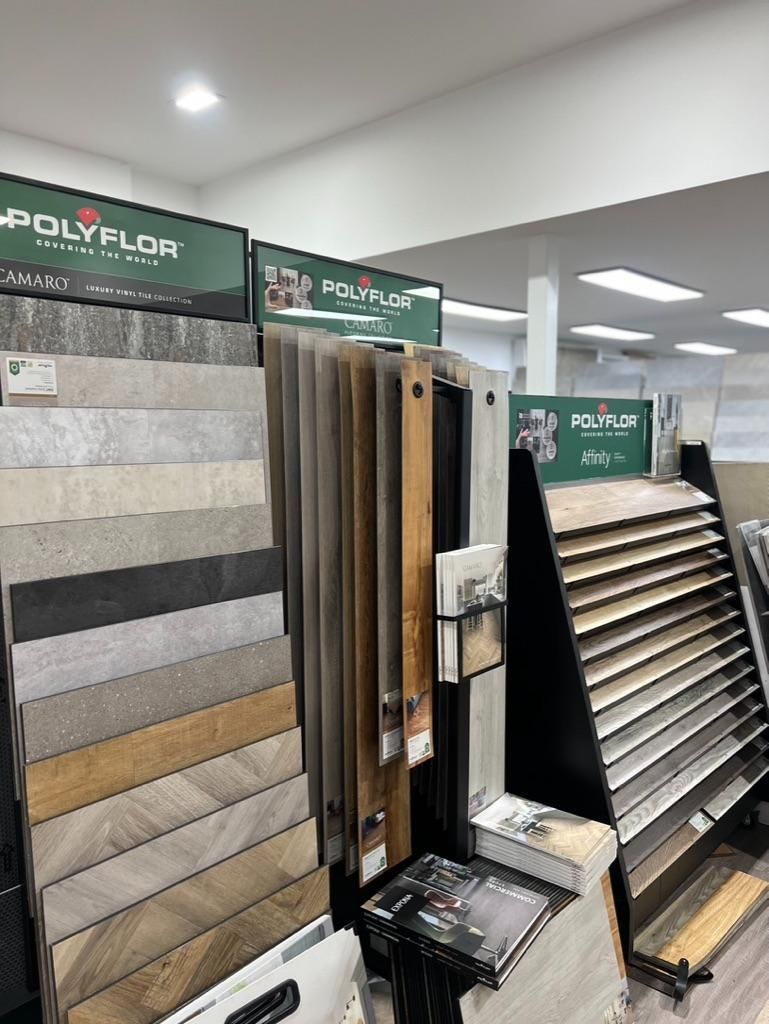 A Showroom Filled With Lots of Different Types of Flooring — Traditional Tiles & Flooring In Cassowary Coast, QLD