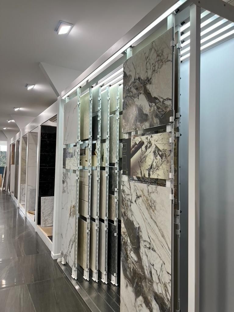 A Showroom Filled With Lots of Tiles and Marbles — Traditional Tiles & Flooring In Woree, QLD