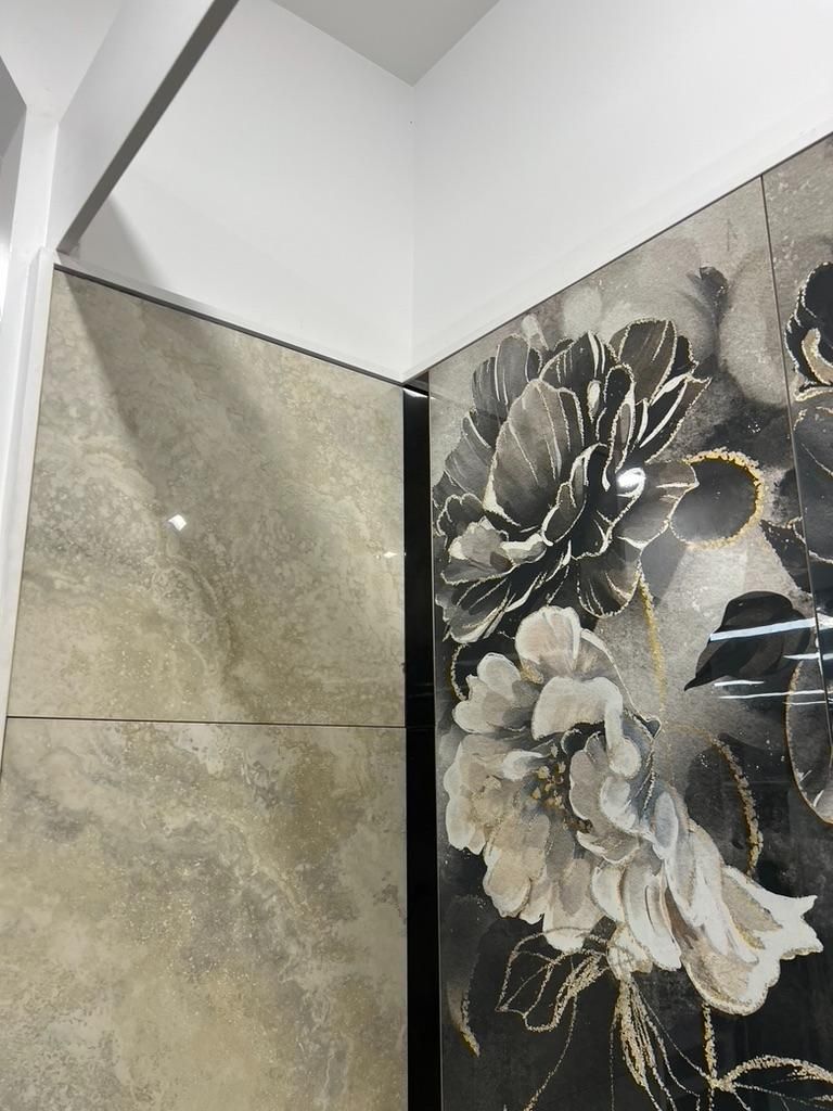 A Bathroom With a Large Tile Wall With Flowers on It — Traditional Tiles & Flooring In Woree, QLD