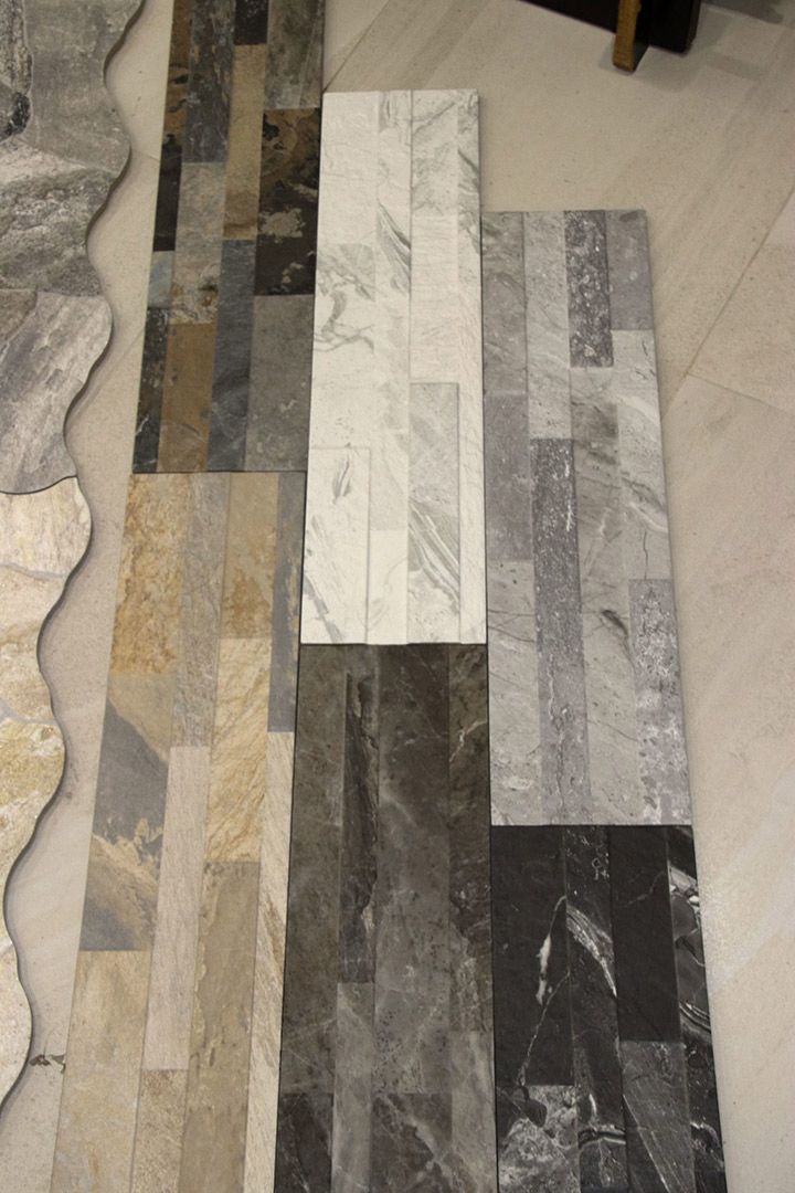A Bunch of Tiles Are Laying on The Floor in A Room — Traditional Tiles & Flooring In Woree, QLD