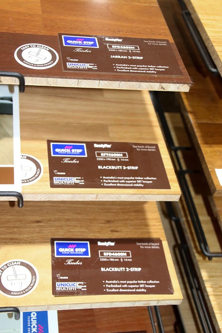 A Display of Different Types of Wood Flooring in A Store — Traditional Tiles & Flooring In Woree, QLD