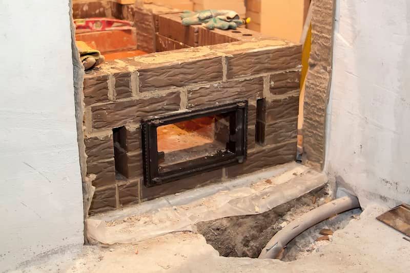 ongoing stucco fireplace making