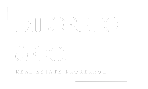 A white logo for a real estate brokerage company on a white background.