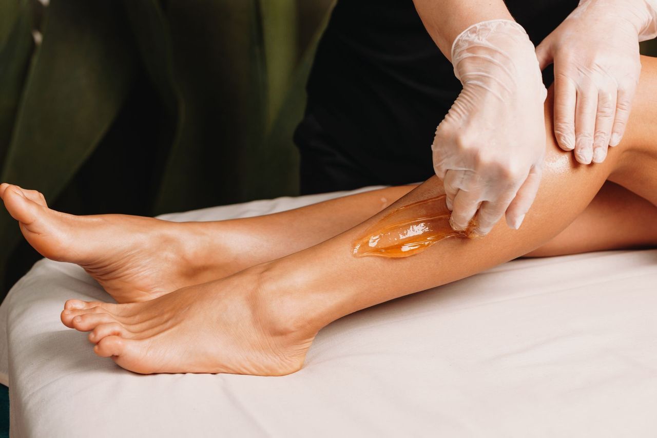 Waxing a Woman's Leg