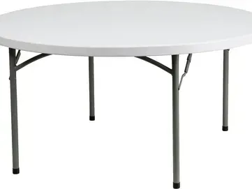 a round folding table with a white top and black legs on a white background .