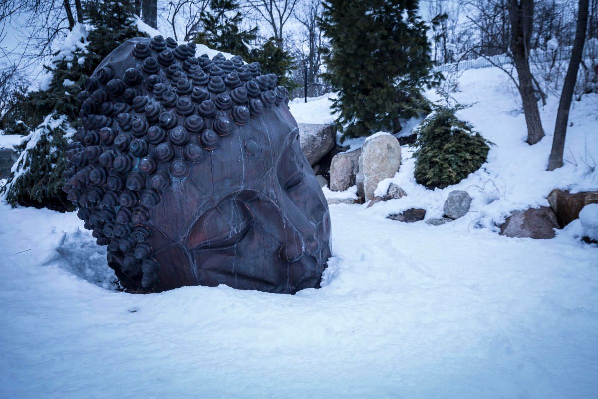 A sculpture in the snow at Frederik Meijer Gardens in the winter.