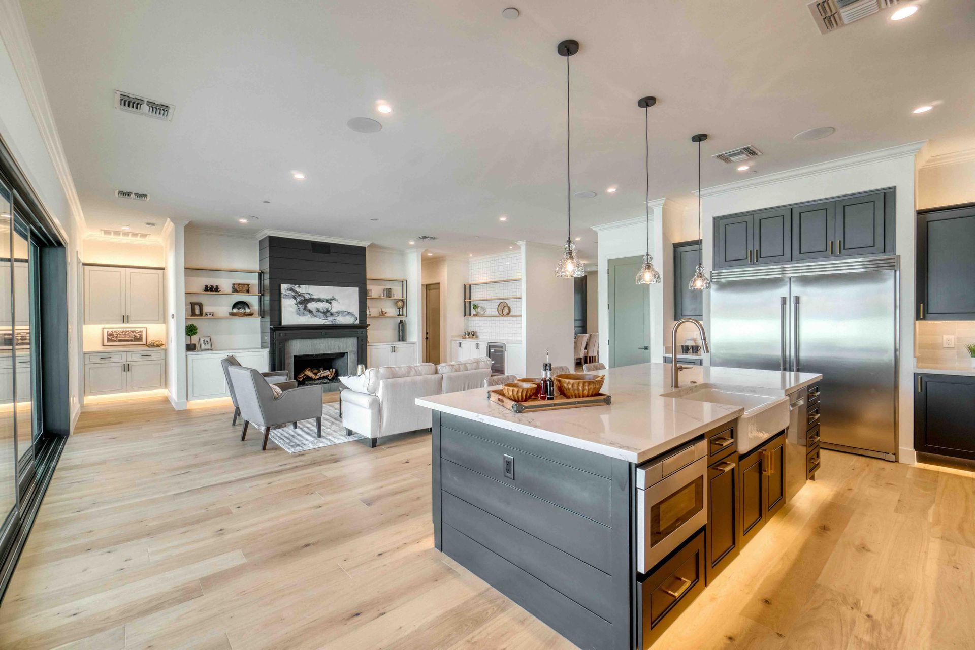 There is a large island in the middle of the kitchen.