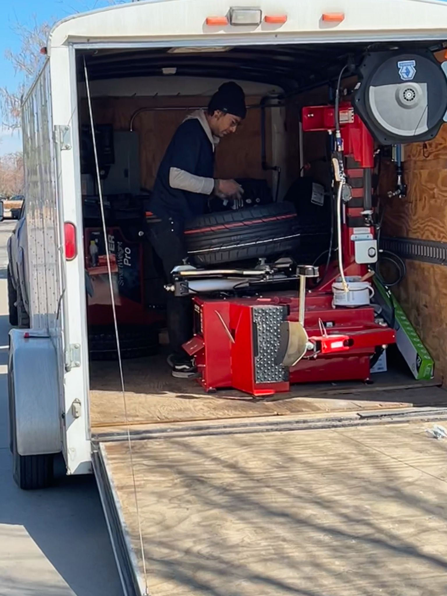 Mobile tire repair at Elevated Tire trailer