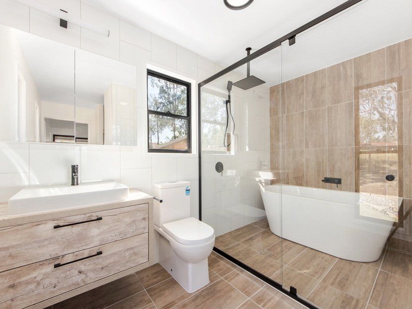 Bathroom Interior with White Tub— Quality Constructions in Maryborough, QLD