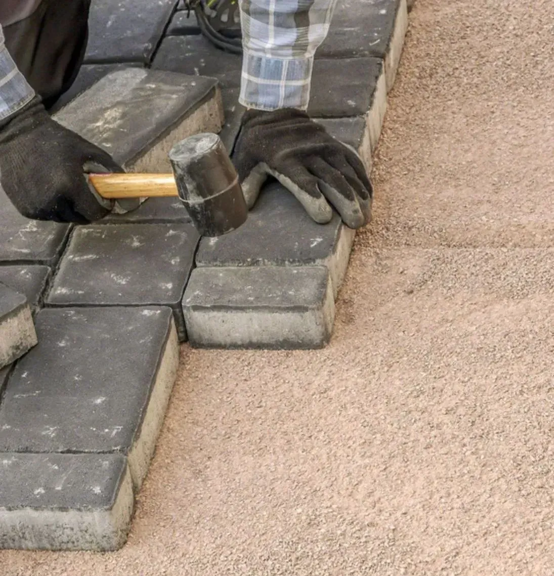 Our skilled team installing hard landscaping on a home in Leicester