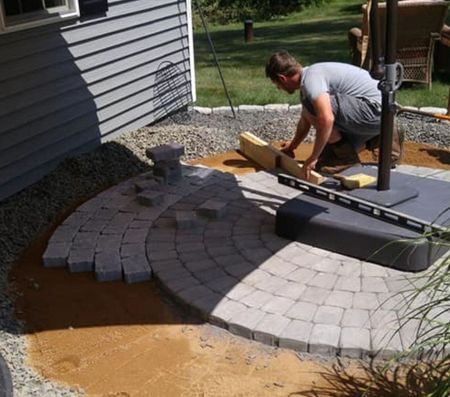 Our skilled team providing hardscaping services at a residence in Spencer
