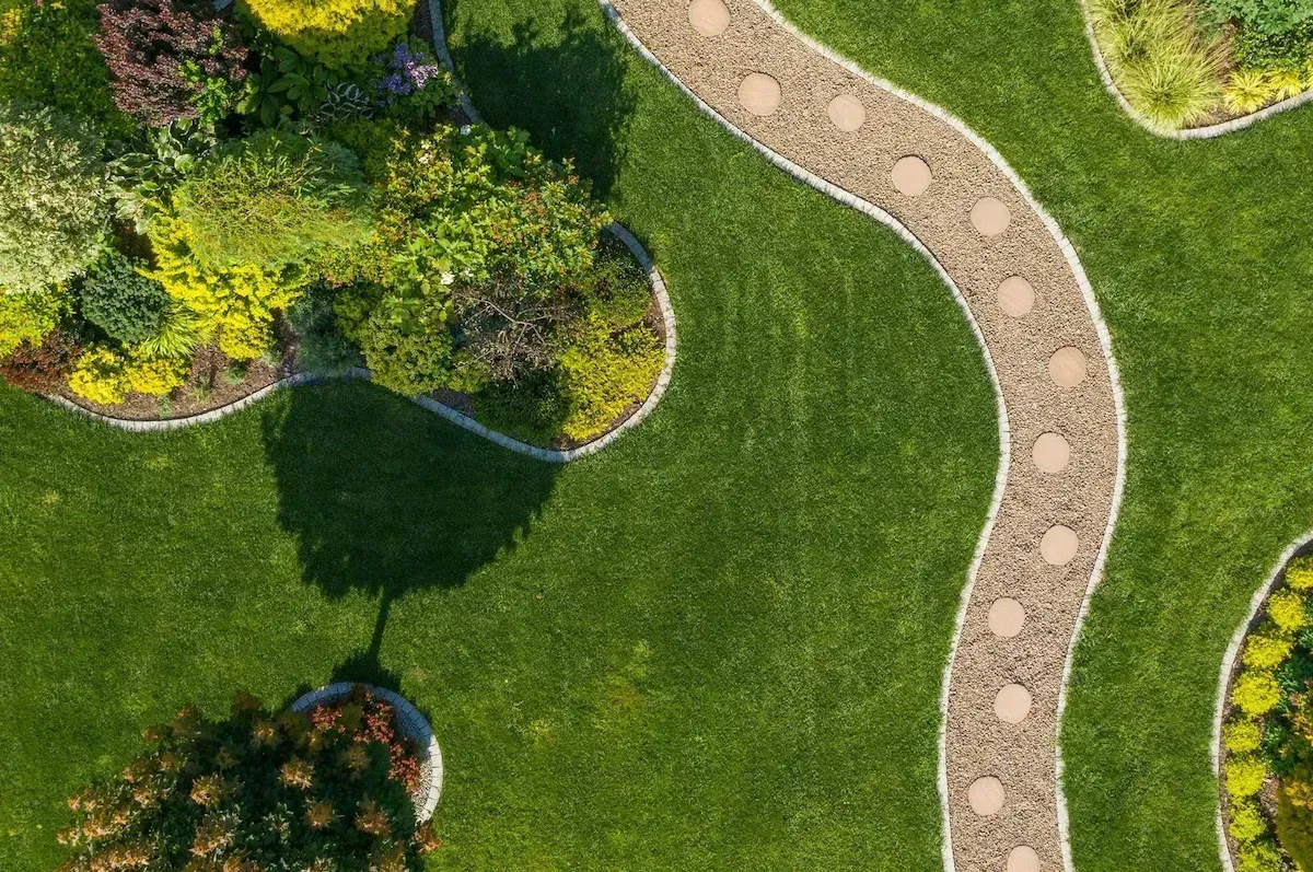 Stone walkway construction by our landscaping team in Spencer, MA