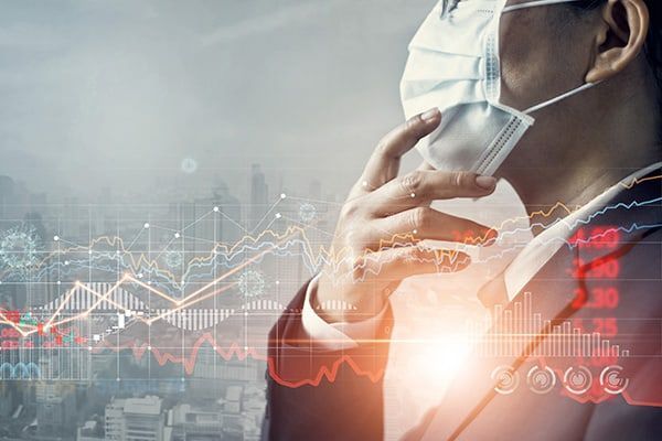 Person in a suit wearing a mask with overlaid red financial graphs and city.