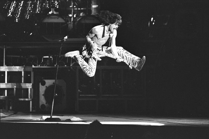 Eddie Van Halen rocking it - playing guitar on stage