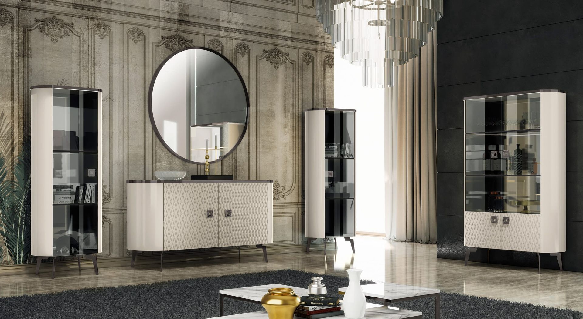 Arredamento del soggiorno: vetrine color crema e nero, specchio rotondo, credenza. Pareti neutre, tappeto e tavolino in marmo.