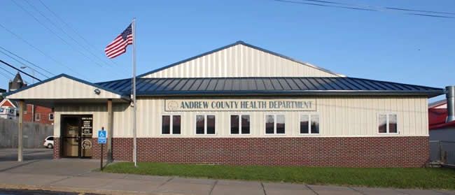 A large building with a flag on top of it.