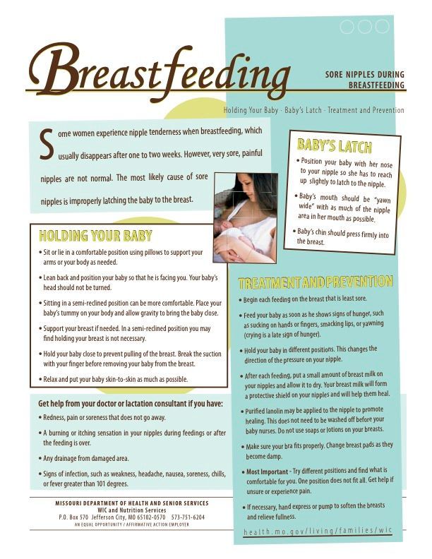 A woman is breastfeeding her baby in a magazine.