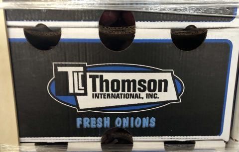A box of fresh onions from thomson international inc.