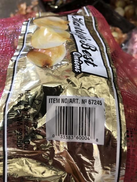 A bag of onions with a barcode on it