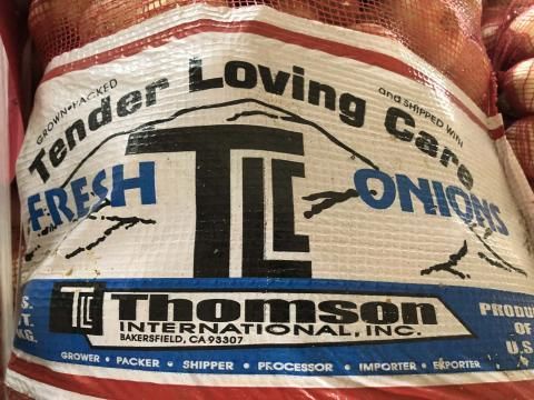 A bag of tender loving care fresh onions from thomson international inc.
